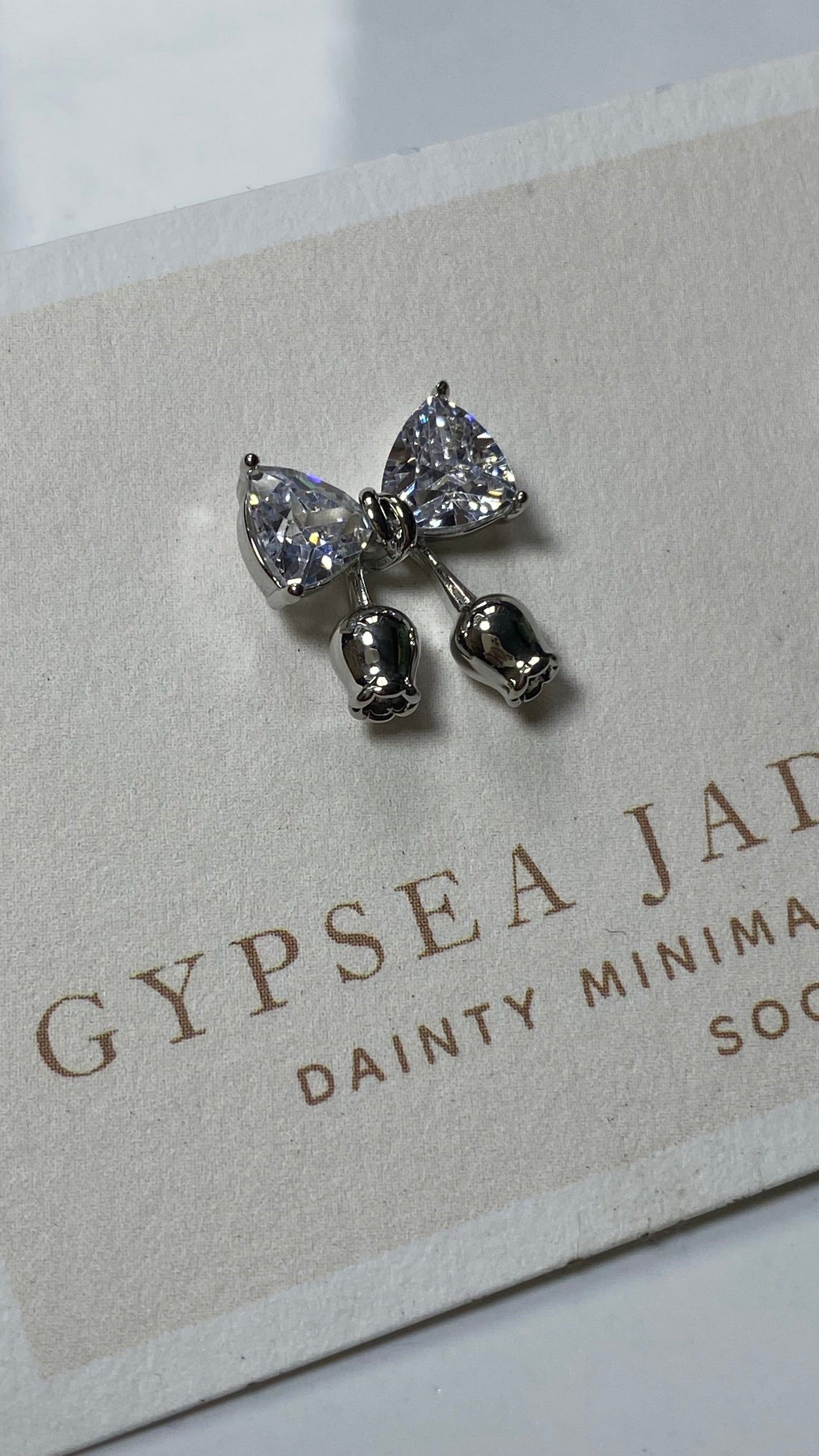 Bow statement earrings in Silver