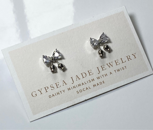 Bow statement earrings in Silver